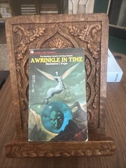 A Wrinkle in Time • Madeleine L’Engle • 1976 Dell Laurel-Leaf • Science Fantasy