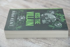 Kiss The Villain: A Dark College mm Romance (Legacy of Gods) by Rina Kent Paper