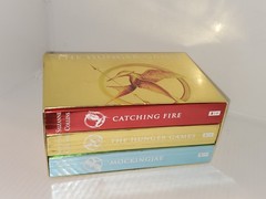 The Hunger Games Box Set: Foil Edition, Paperback by Suzanne Collins.