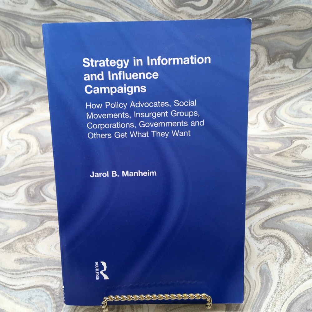 STRATEGY IN INFORMATION AND INFLUENCE CAMPAIGNS By Jarol B. Manheim Very Good