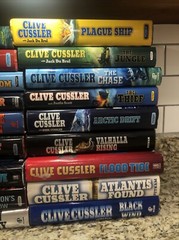 Clive Cussler Hardcover Books Lot of 27 See Photos for Titles Excellent Conditio
