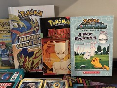 Pokemon Books, Stickers And 100 Cards