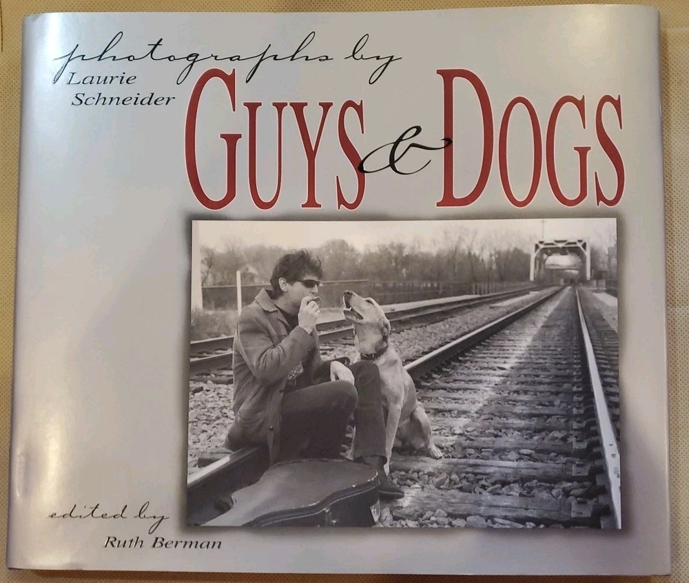 Guys And Dogs By Laurie Schneider