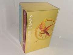 The Hunger Games Box Set: Foil Edition, Paperback by Suzanne Collins.