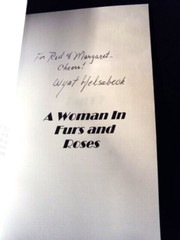 A Woman in Furs and Roses (Signed) by Wyat Helsabeck / Paperback / 240 Pages