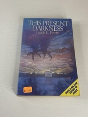 This Present Darkness by Frank E. Peretti Vintage 1986 First Printing Paperback