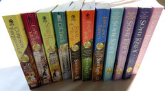 Lot of 11 Paperback Books in the Magical Cats Mystery Series by Sofie Kelly