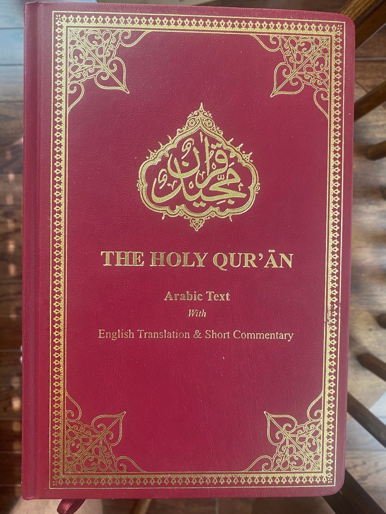 The Holy Qur’an with English Translation and Short Commentary Malik Ghulam Farid