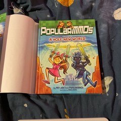PopularMMOs Presents A Hole New World Graphic Novel hardcover book by Pat + Jen