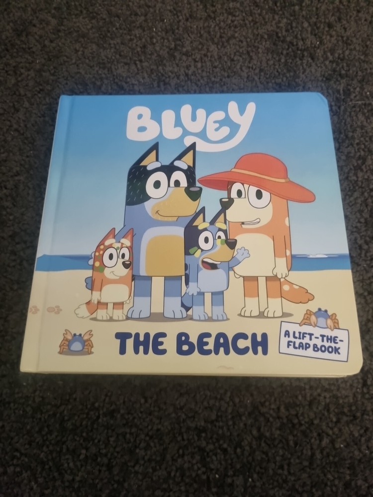 Bluey: The Beach: A Lift-the-Flap Book. [Board book]