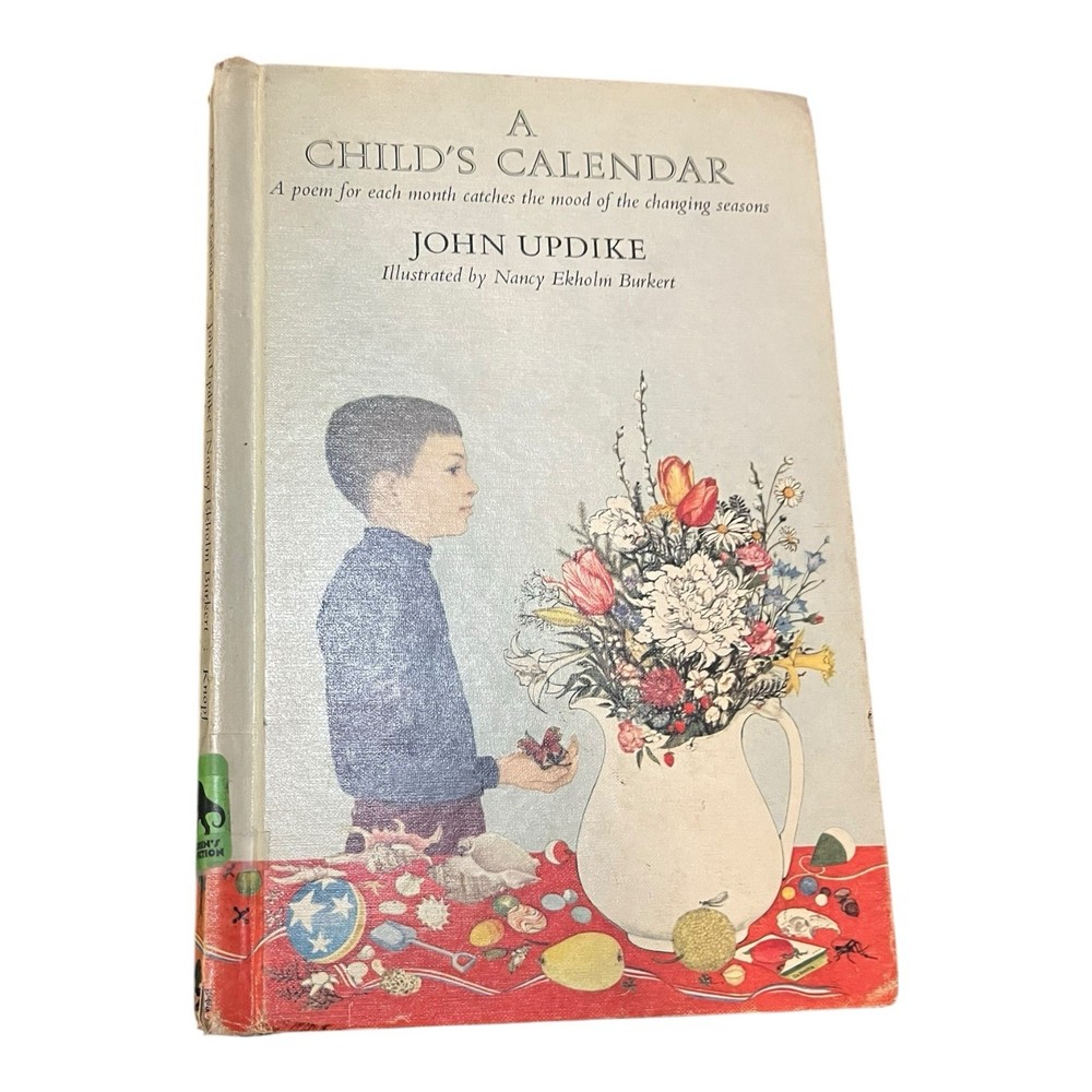A CHILD’S CALENDAR By John Updike & Nancy Ekholm Burkert – Hardcover Ex Library