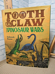 Tooth and Claw: The Dinosaur Wars / Hardcover / 2019 / by Deborah Noyes