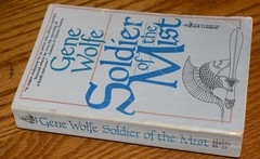 Soldier of the Mist, Gene Wolfe first TOR PB printing October 1987, ex-library