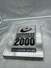 Vintage Guinness Book Of World Records 2000 Millennium Edition Silver Hard Cover