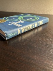 A Wrinkle In Time Madeline L’Engle ⓒ 1962 Thirty-fifth Printing 1976 HC/ DJ