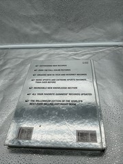 Vintage Guinness Book Of World Records 2000 Millennium Edition Silver Hard Cover