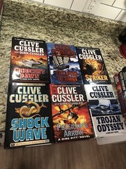 Clive Cussler Hardcover Books Lot of 27 See Photos for Titles Excellent Conditio