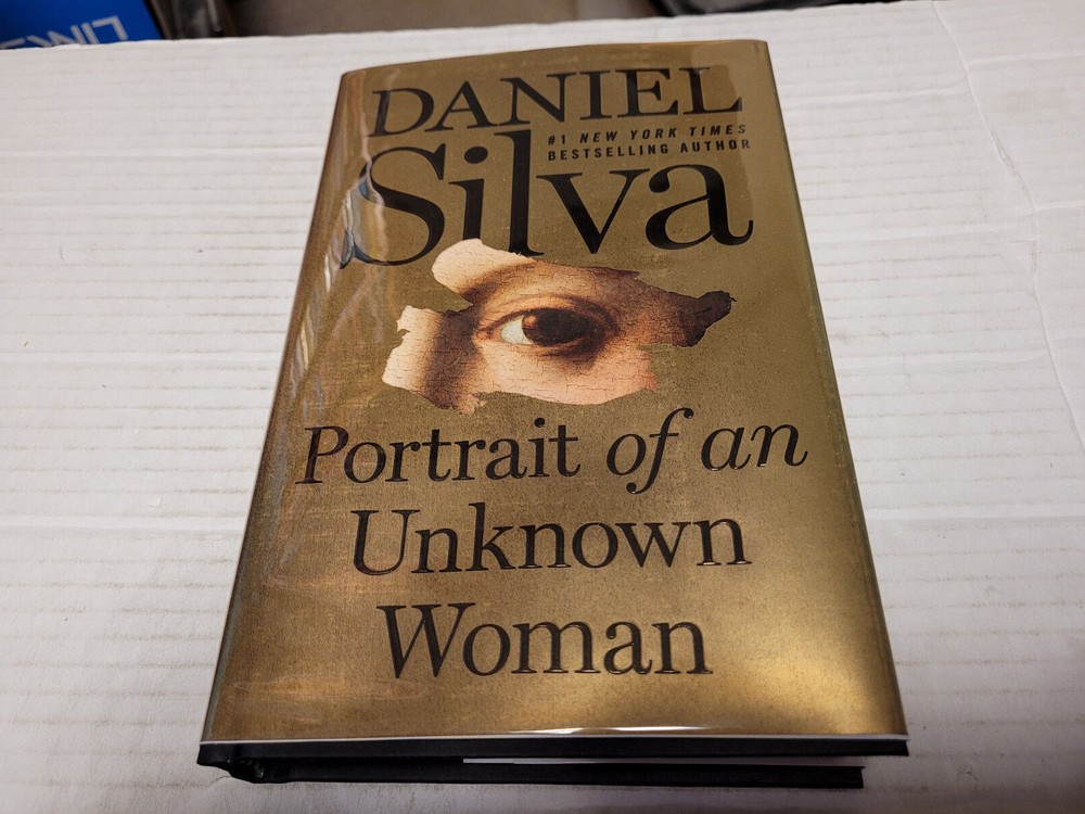 Portrait of an Unknown Woman by Daniel Silva (2022, HC) SIGNED 1st/1st FLAT SIGN