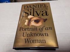 Portrait of an Unknown Woman by Daniel Silva (2022, HC) SIGNED 1st/1st FLAT SIGN