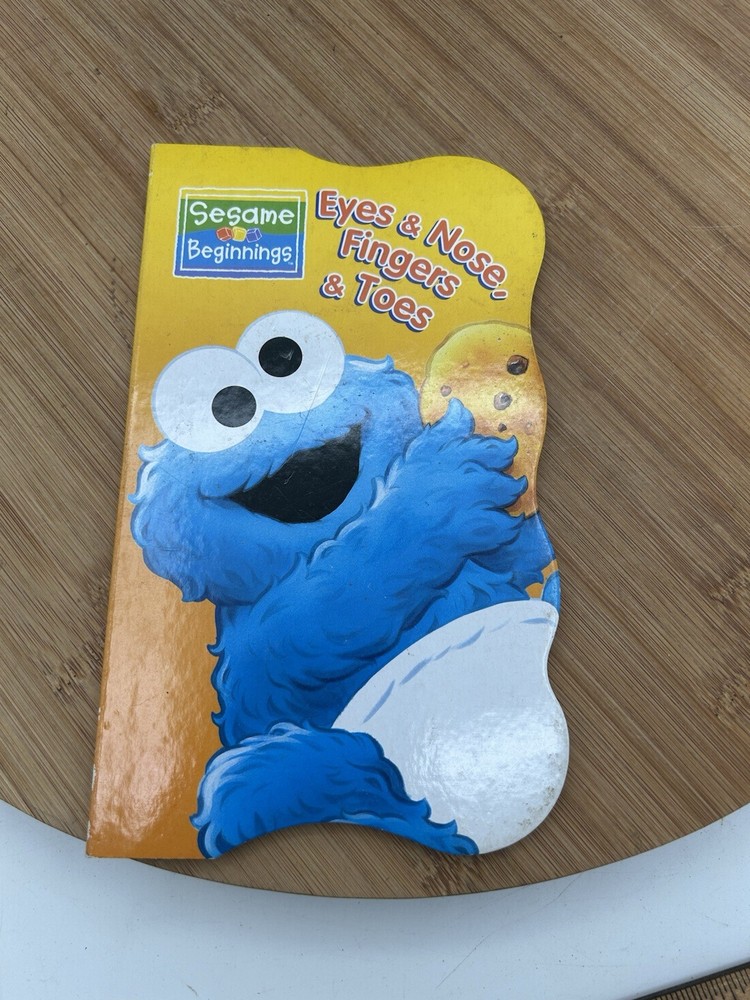 Sesame Beginnings Eyes & Nose, Fingers & Toes Board Book Cookie Monster
