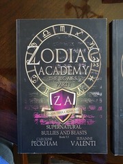 Zodiac Academy Books 0.5 And 5.5 In The Original Matte Black Covers.