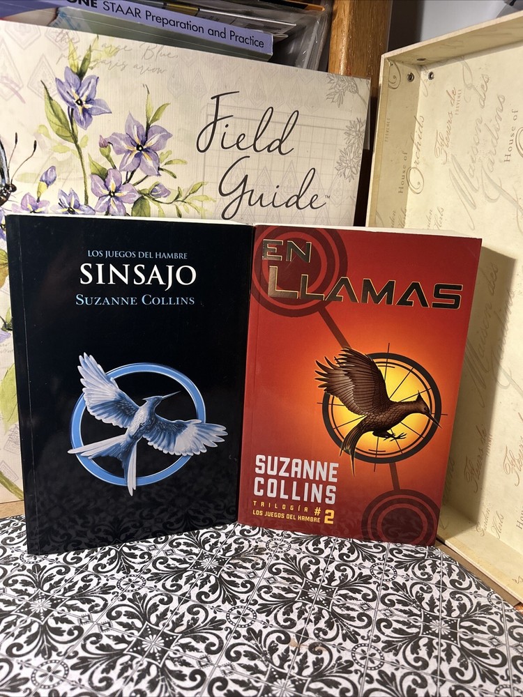 Sinsajo & En Llamas by Suzanne Collins Paperback Set 2 Books Spanish Edition