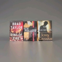 Lot of 3 Brad Taylor, Ken Follett and John Grisham hardcover books As Shown