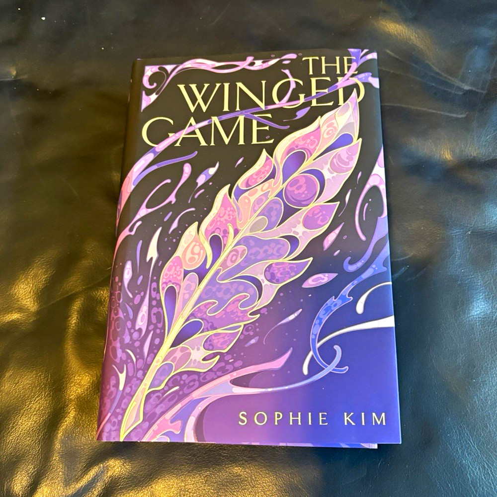 FairyLoot Exclusive HC The Winged Game w/ Dust Jacket – Sophie Kim