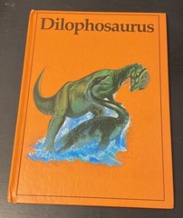 Vintage Rourke Dinosaur Library 7 Books Yellow Orange Peach Decorative Bookshelf