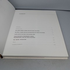 Moments: The Pulitzer Prize-Winning Photographs 2011 Tess Press HC by Hal Buell