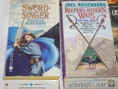 12 Sci-Fi Books Lustbader-Rucker-Lanier-Rosenberg-Roberson-Le Guin-Lyon-Laumer