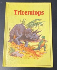 Vintage Rourke Dinosaur Library 7 Books Yellow Orange Peach Decorative Bookshelf