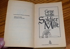 Soldier of the Mist, Gene Wolfe first TOR PB printing October 1987, ex-library