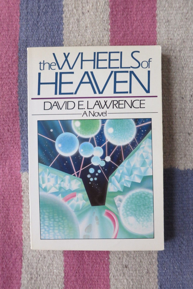 The wheels of Heaven by David E Lawrence – Paperback~ Good Condition