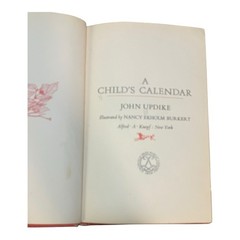 A CHILD’S CALENDAR By John Updike & Nancy Ekholm Burkert – Hardcover Ex Library