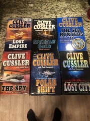 Clive Cussler Hardcover Books Lot of 27 See Photos for Titles Excellent Conditio