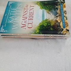 Katie Winters Book Lot Of 2 PB Against Current Blink Of Time Sutton Book Club
