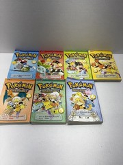 Pokemon adventures volumes 1-7 NICE USED