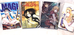 LOT of 4 Random Manga Book Lot – Goblin Slayer, Magi, Battle Angel , Sword Art..