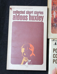 7 VINTAGE ALDOUS HUXLEY PAPERBACK BOOKS: BRAVE NEW WORLD, ISLAND, APE & ESSENCE