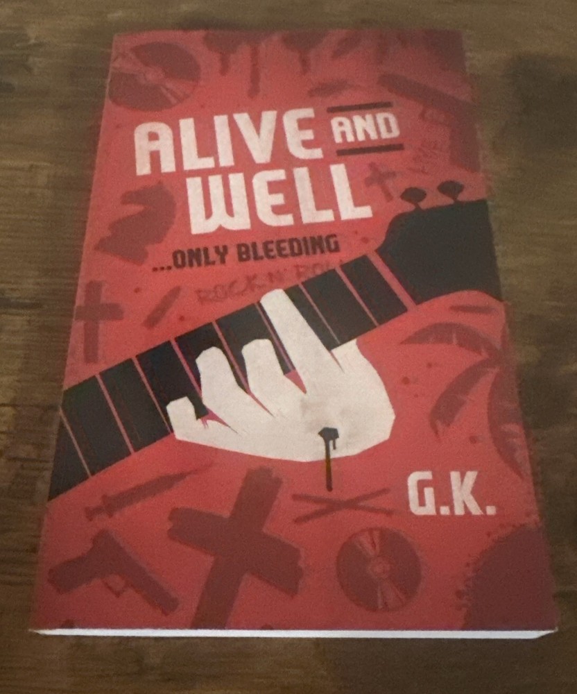 ALIVE AND WELL… Only Bleeding by G.K. (English) Paperback Book