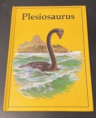 Vintage Rourke Dinosaur Library 7 Books Yellow Orange Peach Decorative Bookshelf