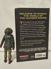 The World of the Hunger Games Book Combo w/Rue Poseable Figure & Mockingjay