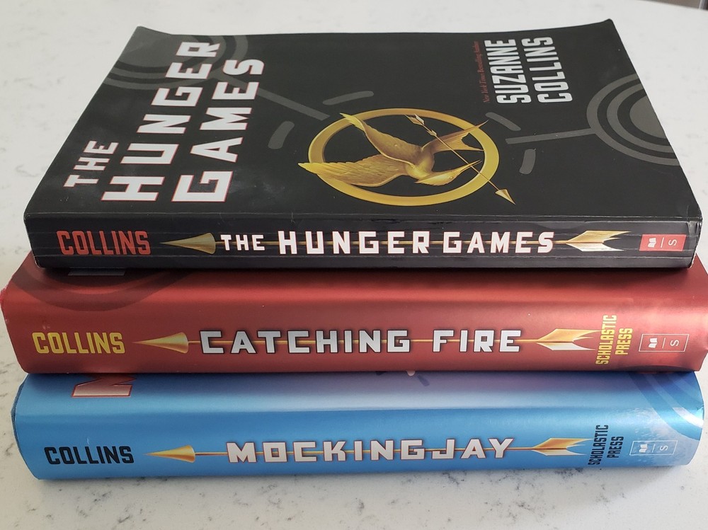 Lot of 3-The Hunger Games, Catching Fire & Mockingjay by Suzanne Collins 1PB 2HC