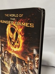 The World of the Hunger Games Book Combo w/Rue Poseable Figure & Mockingjay