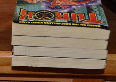 Turok paperback Book Set 1 2 3 4 by Teitelbaum Gold Key based on video game M2