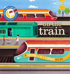 On the Train (A Shine-A-Light Book ) – Hardcover – GOOD