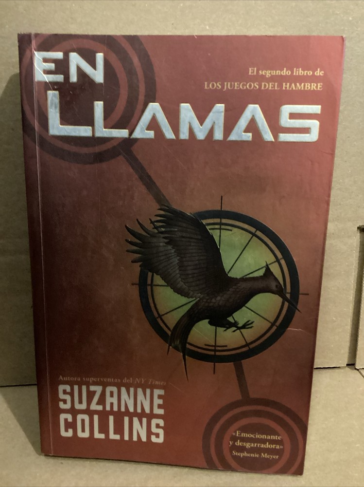 En llamas los Juegos del Hambre, by Suzanne Collins (2009) Spanish Paperback