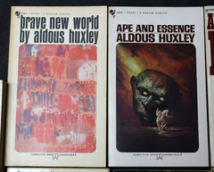 7 VINTAGE ALDOUS HUXLEY PAPERBACK BOOKS: BRAVE NEW WORLD, ISLAND, APE & ESSENCE