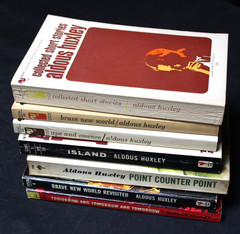 7 VINTAGE ALDOUS HUXLEY PAPERBACK BOOKS: BRAVE NEW WORLD, ISLAND, APE & ESSENCE